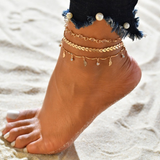 Brazalete en el tobillo de oro y cristal