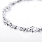 Pulsera con Patas de Perro Colgantes y Huesos de Plata Pura, Edición Limitada