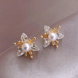 Pendientes de flores con cristales y perlas