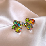 Pendientes de circonita colorida en elegante oro