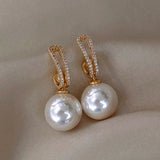 Elegantes pendientes con perlas y circonitas