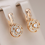Pendientes redondos elegantes de circonita y oro