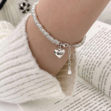 Elegantes pulseras con corazón de plata