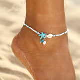 Pulsera con estrellas y concha con piedras naturales