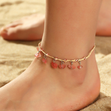 Pulsera de cristal rojo y oro