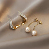 Pendientes dorados con margaritas