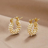Pendientes dorados con perlas