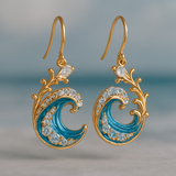 Pendientes dorados con ondas brillantes