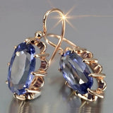 Pendientes dorados con zirconia ovalada