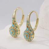 Pendientes de oro con clúster de turquesa