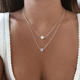 Collar con corazón de plata y margaritas