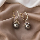 Pendientes colgantes con perlas