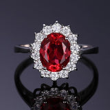 Anillo Clásico con Rubí y Bisel de Oro Blanco