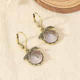 Pendientes circulares de plata antigua