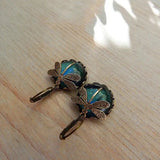 Pendientes de libélula en forma de esfera en color dorado antiguo