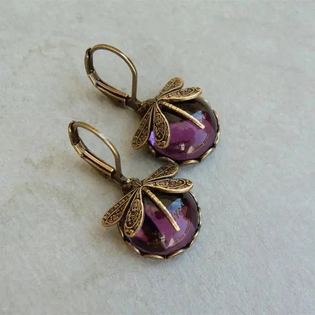 Pendientes de libélula en forma de esfera en color oro antiguo