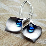 Pendientes de loto en color plata