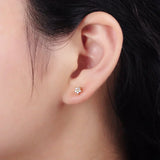 Pendientes de aro con delicado motivo floral