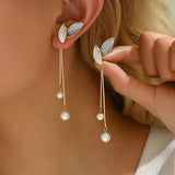 Pendientes en forma de hoja con perlas