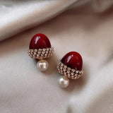 Pendientes con perlas rojas
