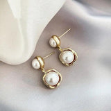 Pendientes con margaritas doradas