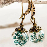 Pendientes retro de flores en oro antiguo