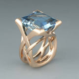 Anillo Retro de Oro Rosa con Zirconitas Azules