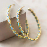Pendientes retro dorados con ópalo azul