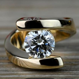 Anillo retro en forma de espiral con circonitas