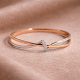 Anillo trenzado de oro rosa y plata