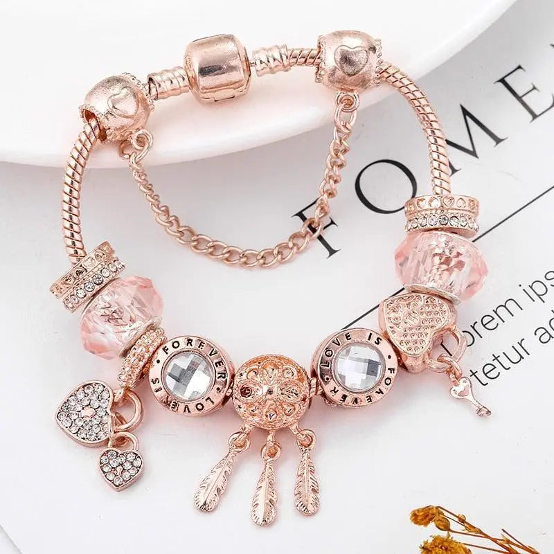 Pulsera de atrapasueños rosa con colgantes de plata