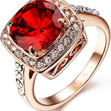 Anillo de rubí con corona de oro rosado