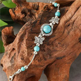 Pulsera de mariposa de oro blanco