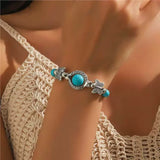 Pulsera de mariposa de oro blanco