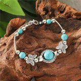 Pulsera de mariposa de oro blanco