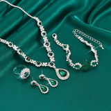 Conjunto de joyas Adriana Lysandra | Oro blanco