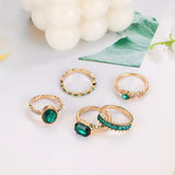 Conjunto de Anillos con Brillo Esmeralda