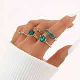 Conjunto de Anillos con Brillo Esmeralda