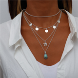 Collar plateado con piedras azules