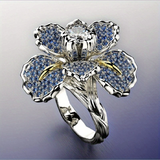 Anillo de Plata con Flores Azules y Cristal