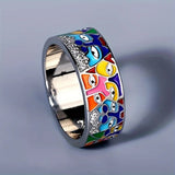 Anillo de plata con ojos de colores