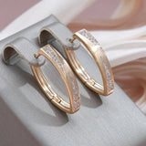Pendientes brillantes de oro y diamantes