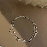 Pulsera ajustable con corazón de plata