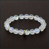 Pulsera de confianza con margaritas y piedra lunar