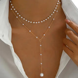 Collar de perlas de dos hileras con colgantes
