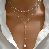 Collar de perlas de dos hileras con colgantes